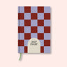 Blue Berry Check weekly 2027 diary with on a pink background. B Corp. Recycled paper.