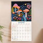 Wall calendar showing UK and US holidays week numbers and moon phases