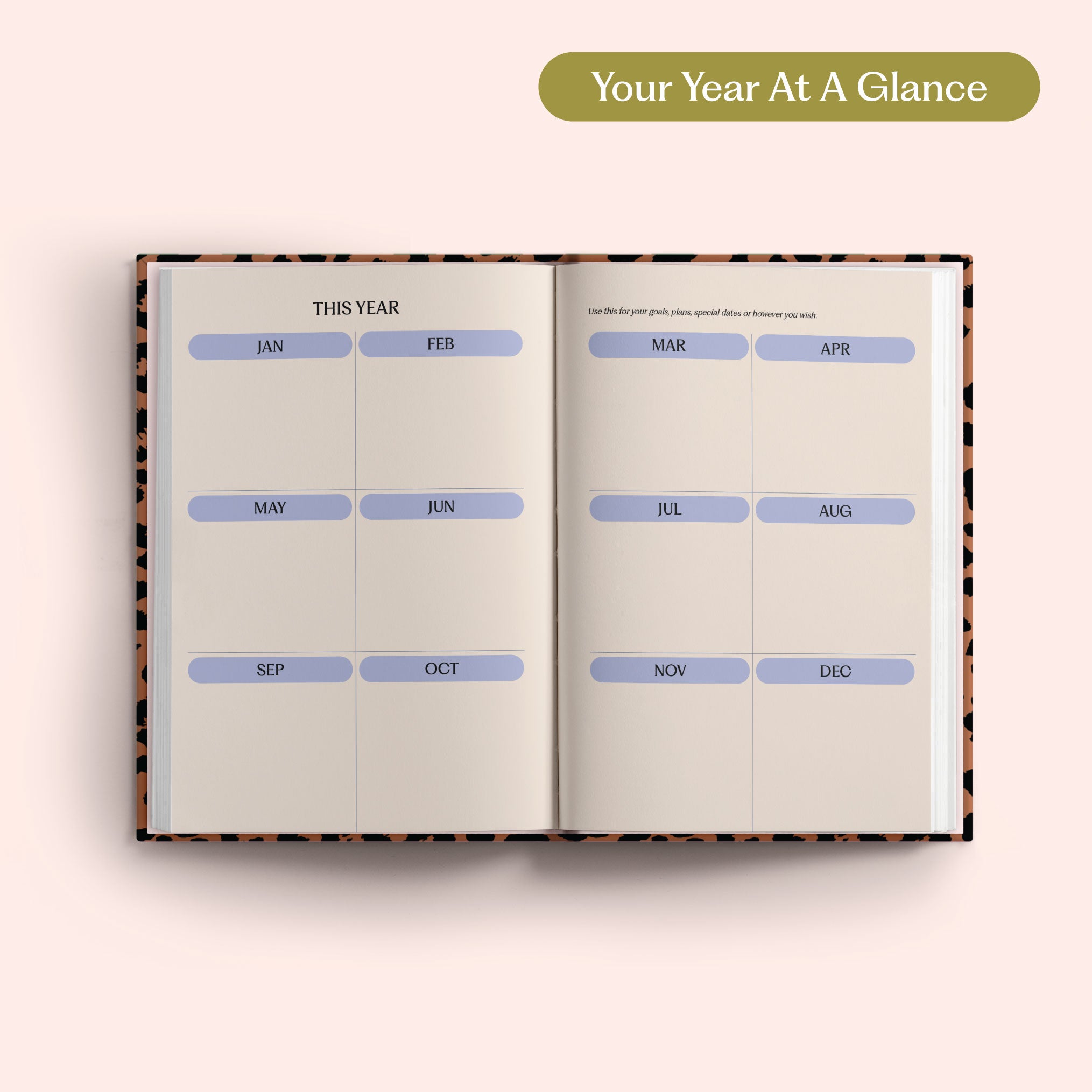 Open planner with 2027 year-to-view on a pink background. B Corp. Year Planner.