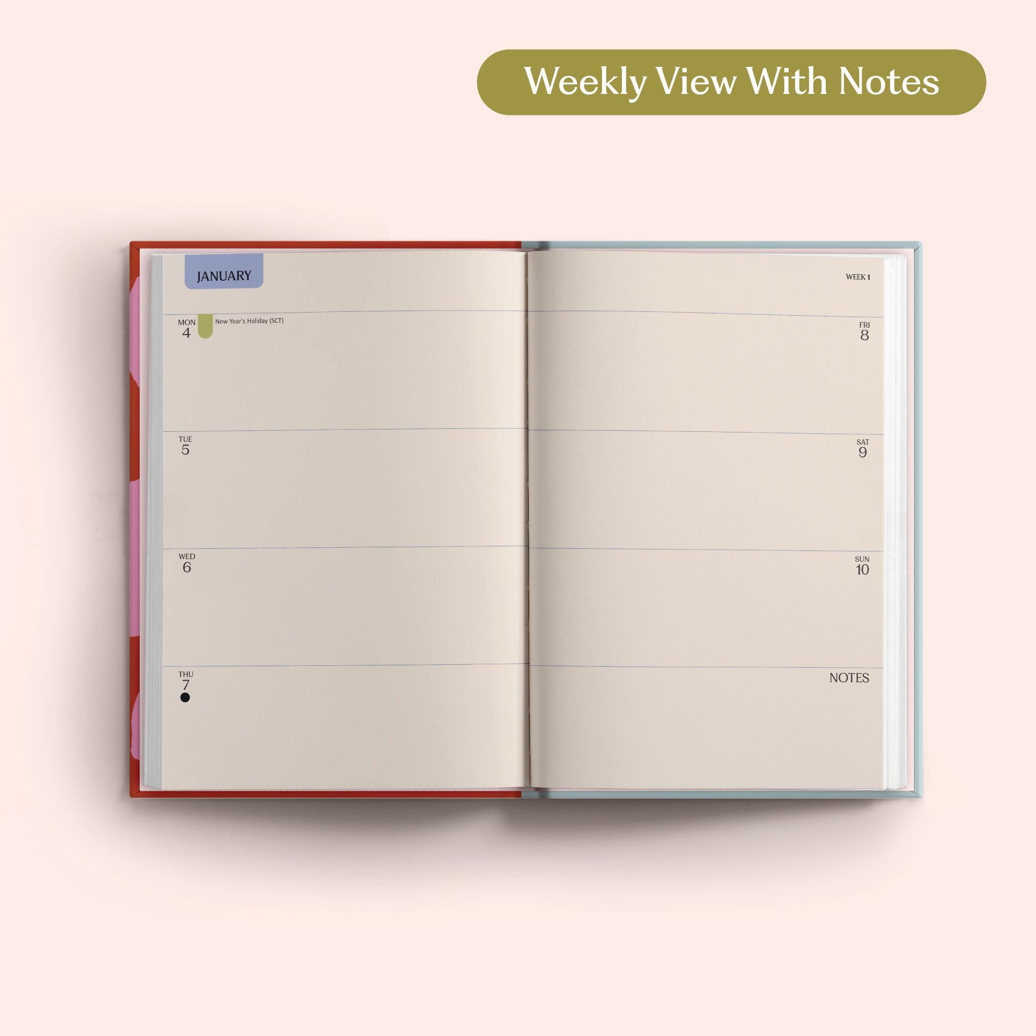 Open planner showing a weekly view with notes on a pink background. Recycled Paper.