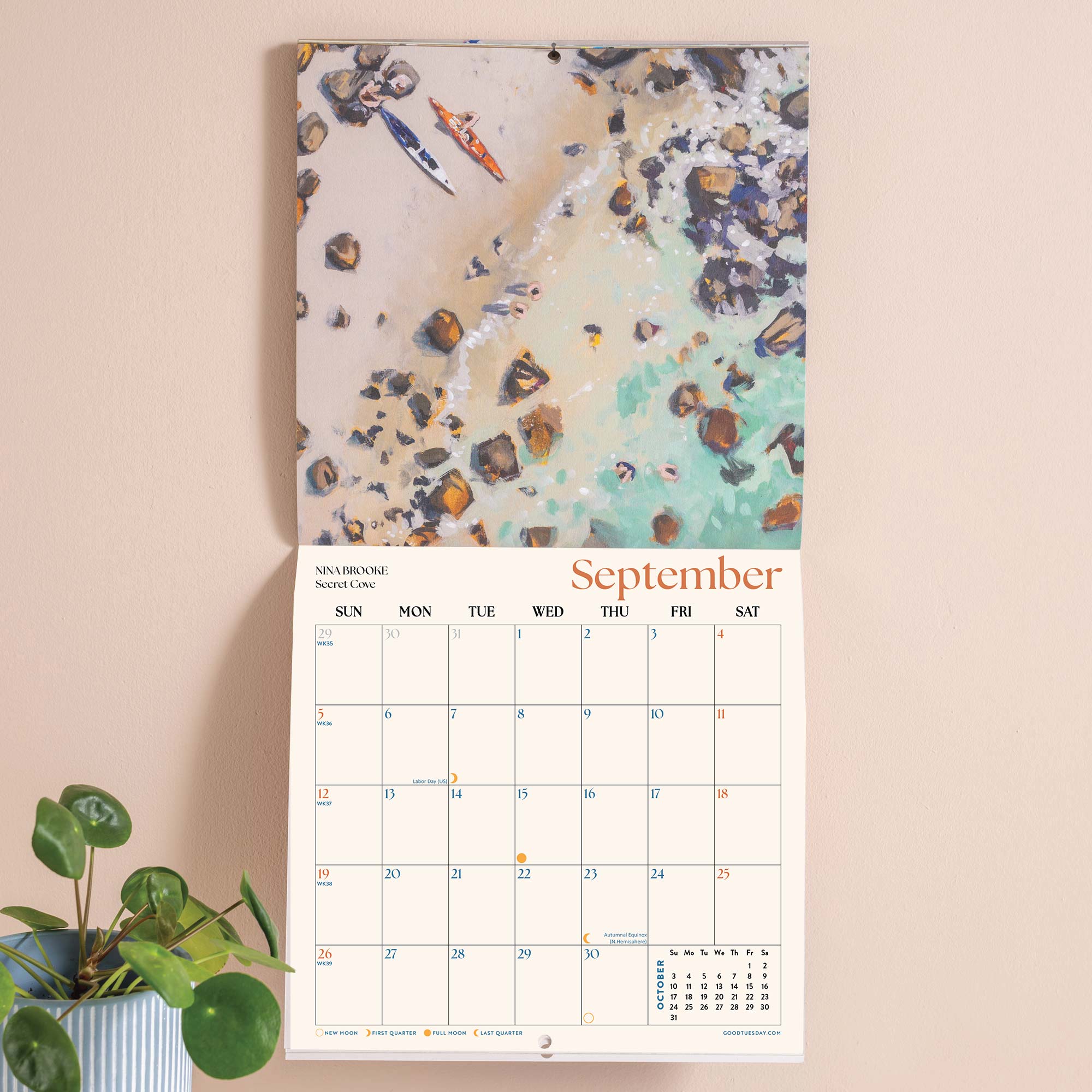Month to view page of 2027 calendar with large date grid and hand-painted ocean scene