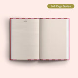 Open 2027 Diary with lined and dotted pages on a pink background.
