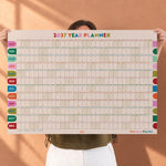 2027 year wool planner in retro contrasting colours with a colourful aesthetic. Includes moon phases and weekends highlighted. by Good Tuesday. 