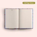 Open 2027 Diary with lined and dotted pages on a pink background.