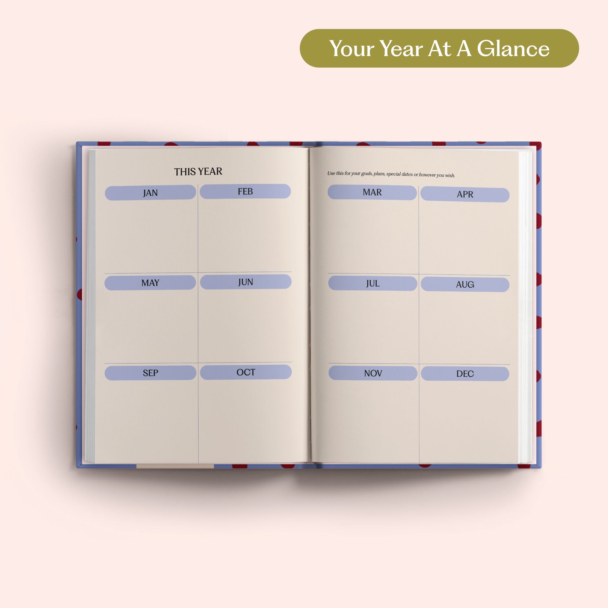Open planner with 2027 year-to-view on a pink background. B Corp. Year Planner.
