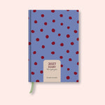 Purple Polka weekly 2027 diary with on a pink background. B Corp. Recycled paper.