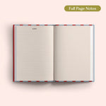 Open 2027 Diary with lined and dotted notes pages on a pink background