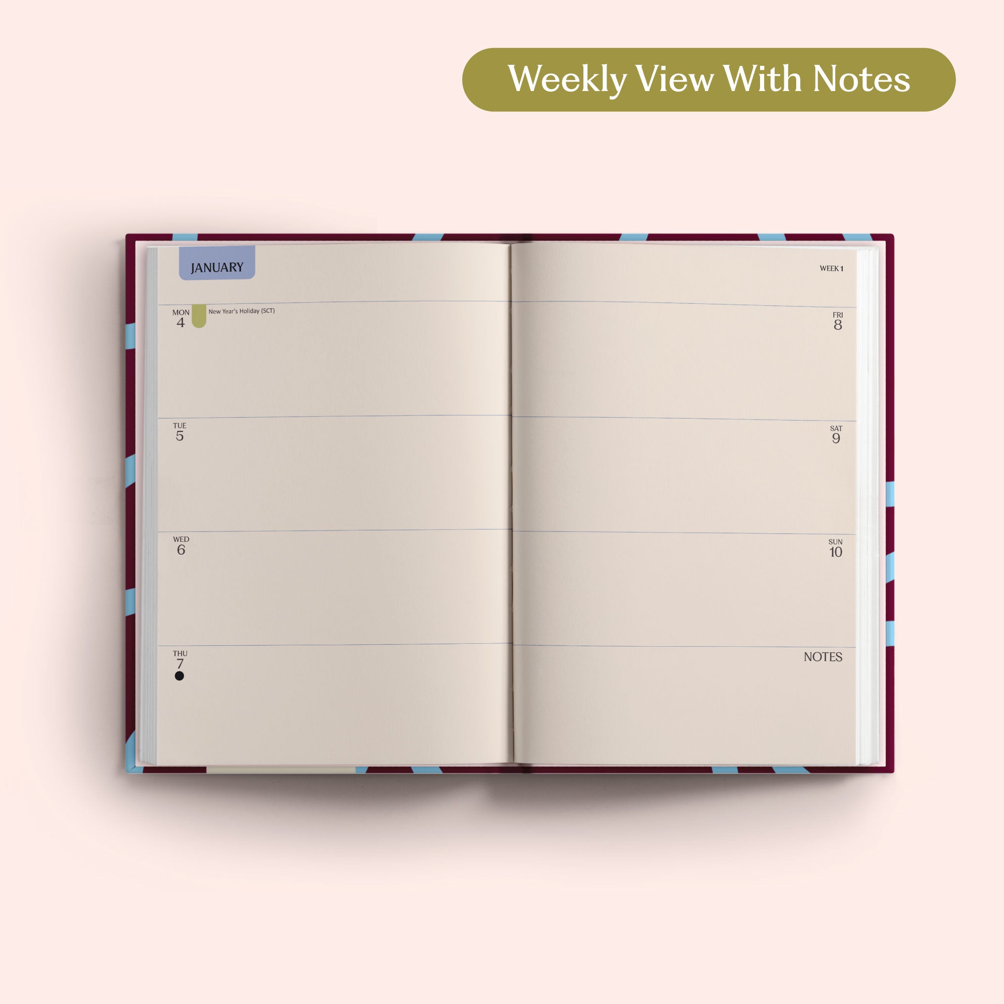 Open planner showing a weekly view with notes on a pink background. Recycled Paper.