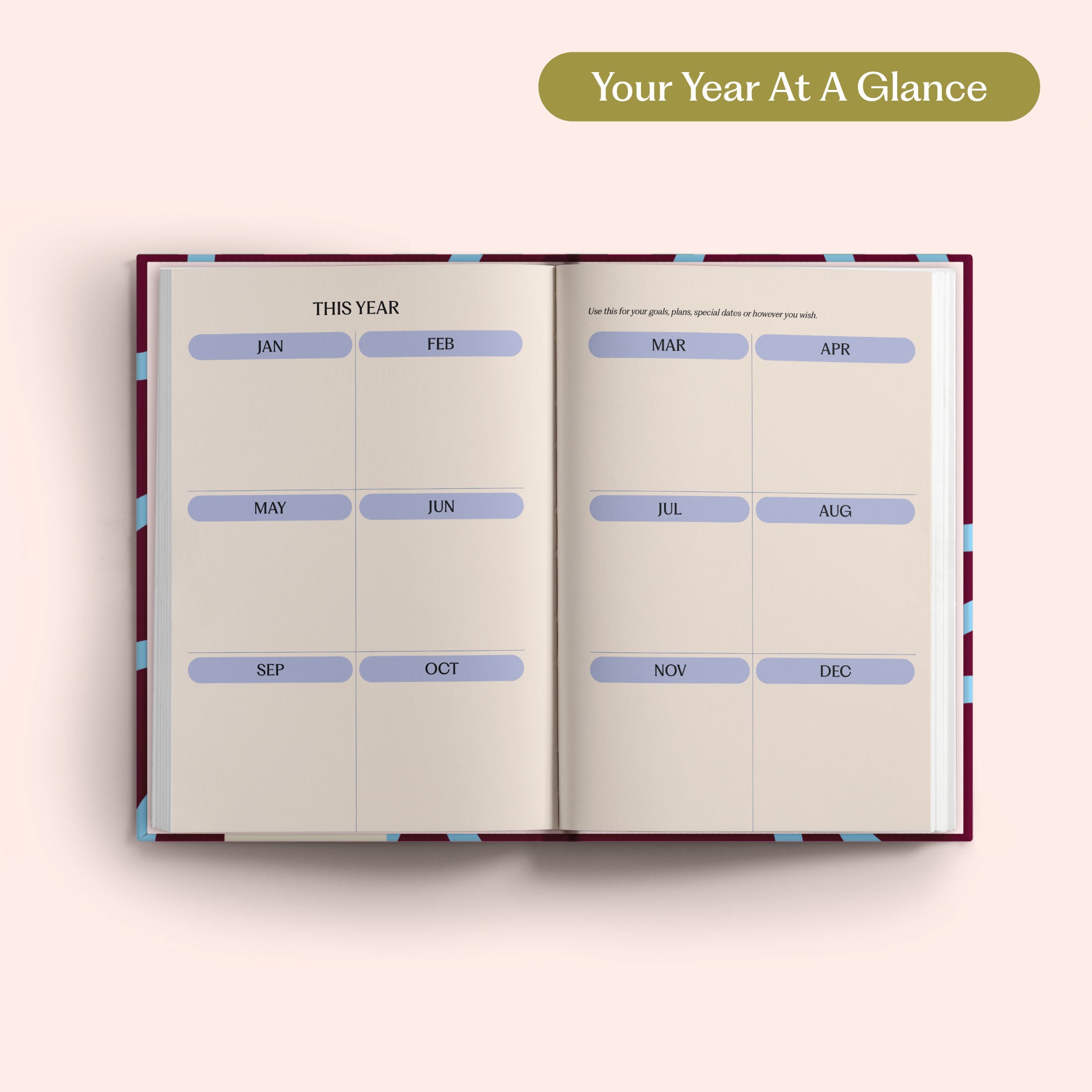Open planner with 2027 year-to-view on a pink background. B Corp. Year Planner.
