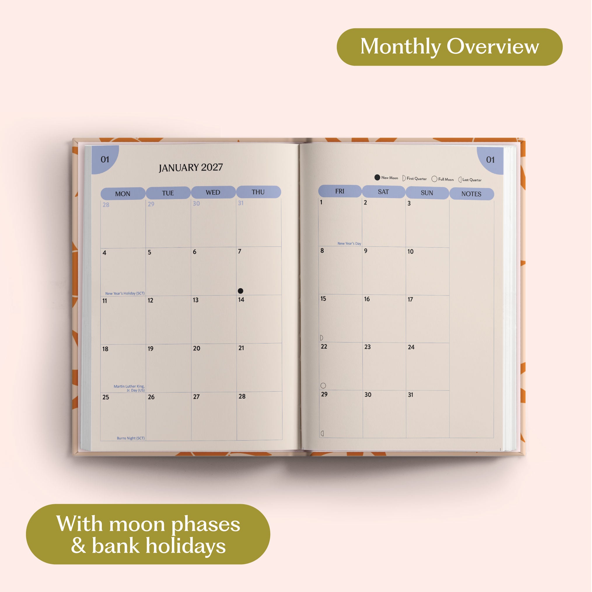 Open planner showing month-to-view January 2027 with moon phases and bank holidays on a pink background.