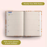Open planner showing a weekly view with notes on a pink background. Recycled Paper.