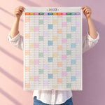 2027 year wall planner calendar in rainbow colours with weekends highlighted and moon phases showing by Good Tuesday