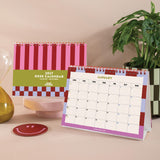 Back cover of the 2027 Desk Calendar showing the full 12 month layout in design Checks and Stripes