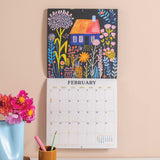 Wall calendar with bright and bold floral and house design