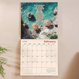 Inside of the Journey of Healing 2026 calendar. Large monthly grid with week numbers, bank holidays, and lunar phases.