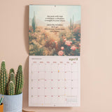 Good Tuesday 2026 calendar with a floral and cactus image, and an inspiring quote 