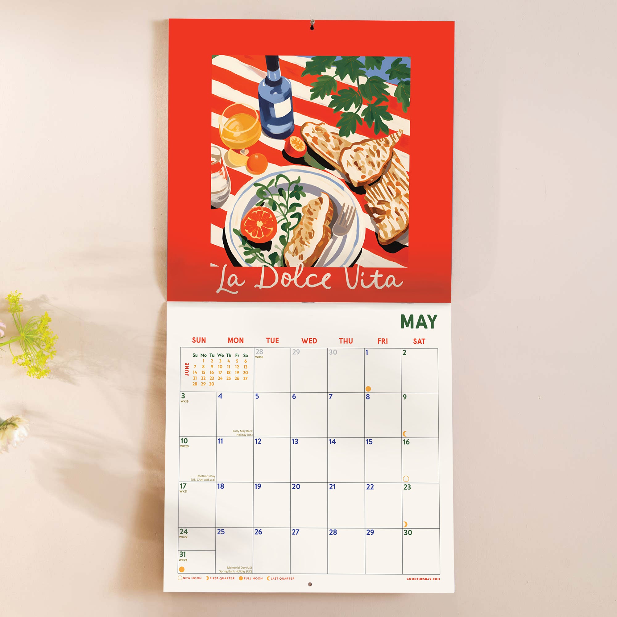 Inside of the La Dolce Vita 2026 calendar, showing the planner in use. Large monthly grid with week numbers, bank holidays, and lunar phases.