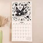 Inside of the Mystical Creatures 2026 calendar. Large monthly grid with week numbers, bank holidays, and lunar phases.