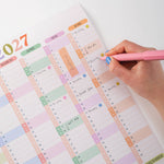 2027 Wall Planner in use, in the design of soft focus.