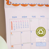2027 songbirds wall calendar printed on recycled paper with hanging hole detail, made in the UK in plastic free packaging