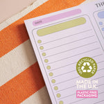 Close up of triple section to do list pad with clear categories for planning