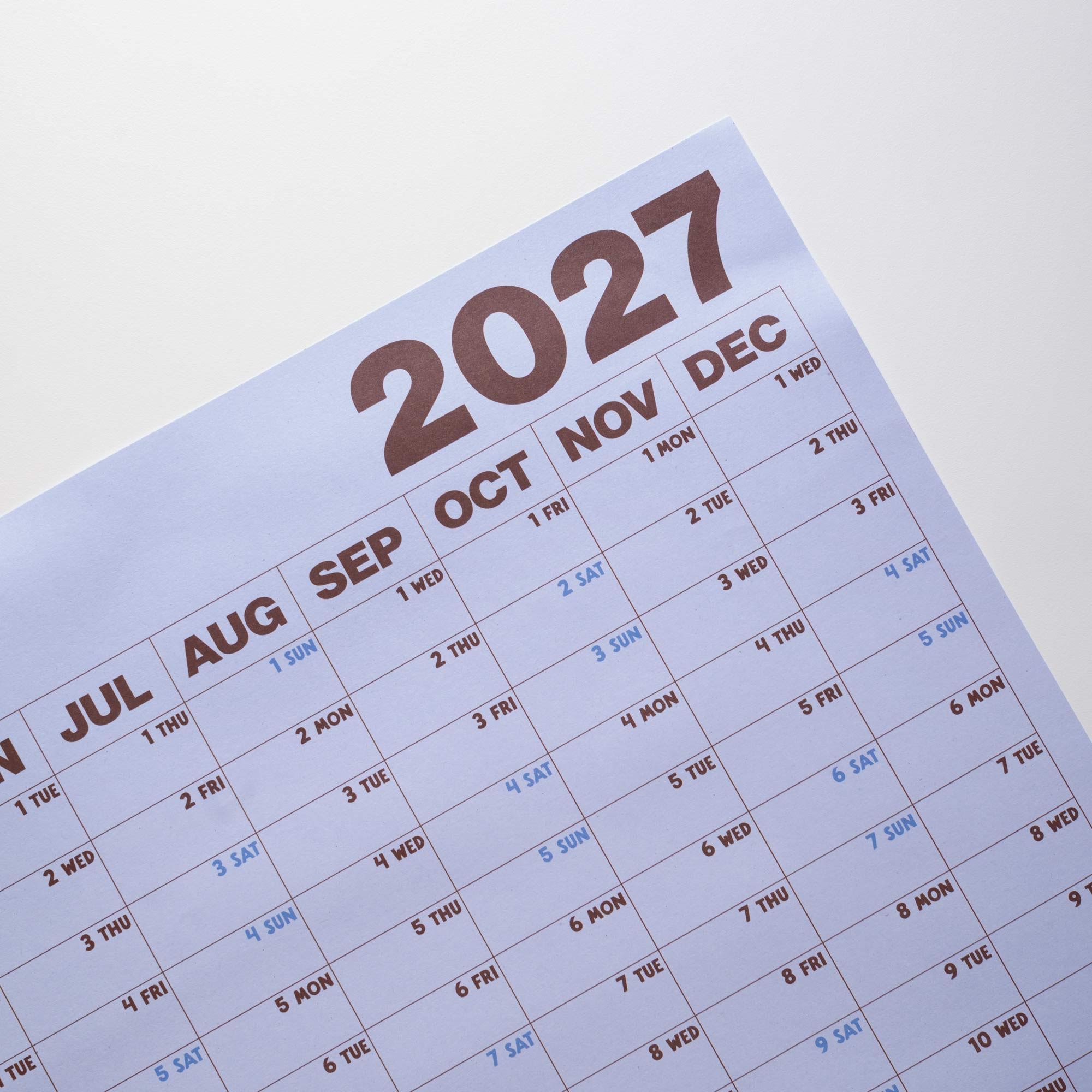2027 Glacier Blue wall planner, week numbers and monthly grid layout