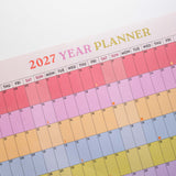 2027 Rainbow wall planner, week numbers and monthly grid layout