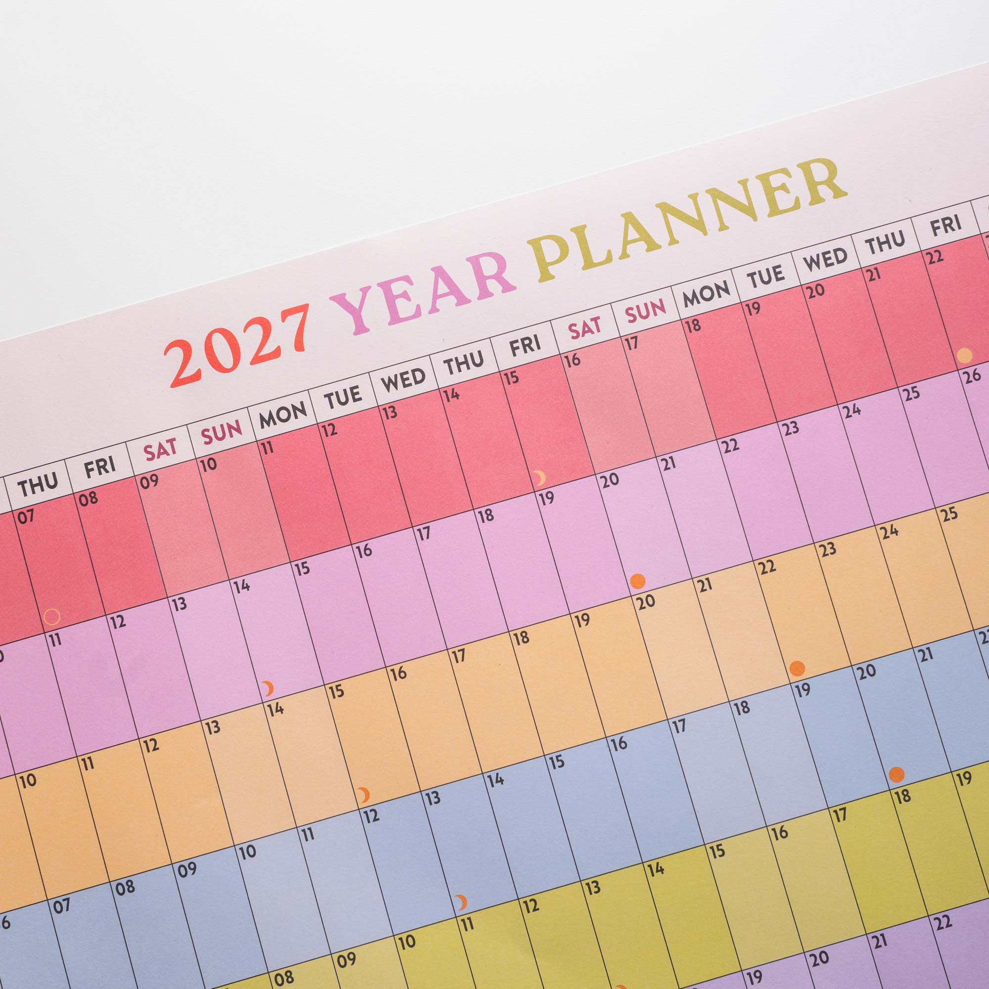 2027 Rainbow wall planner, week numbers and monthly grid layout