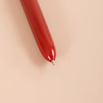 Retro-inspired multicolour pen by Kikkerland, shown in Red
