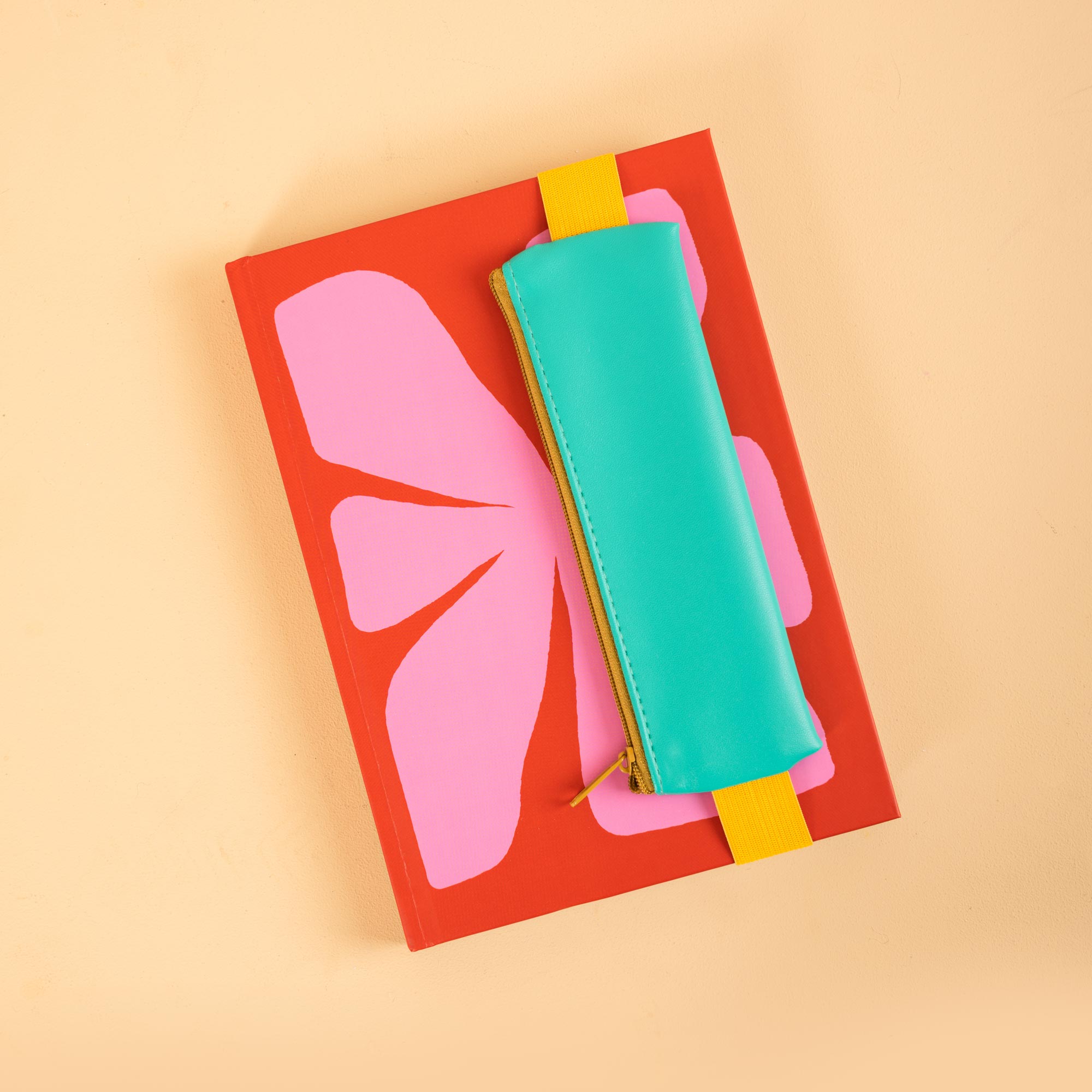 Smooth-running zip with contrast fabric pull tab, Kikkerland pencil pouch in Turquoise