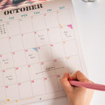 Good Tuesday 2026 Calendar with retro future spacescapes, fun, playful, designs, generous boxes for writing, sunday week start