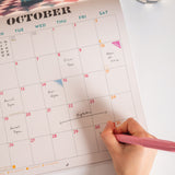 Good Tuesday 2026 Calendar with retro future spacescapes, fun, playful, designs, generous boxes for writing, sunday week start