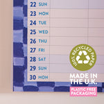 Close up of A3 family wall calendar printed on recycled paper with made in UK and plastic free packaging badges