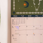 Academic year calendar showing UK and US holidays moon phases and week numbers
