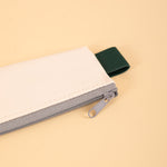 Soft-touch, wipe-clean pencil pouch in Cream, 26.3 x 22cm, by Kikkerland