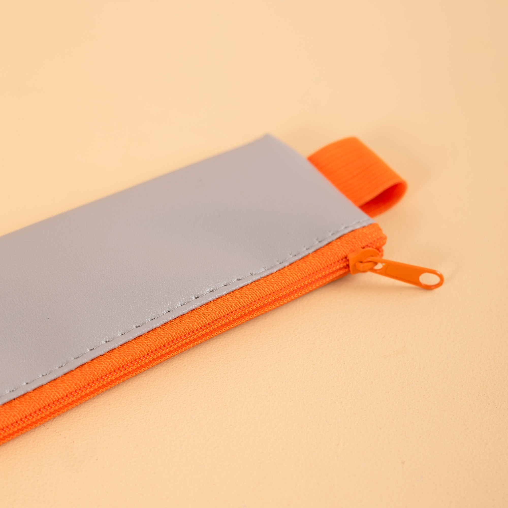Soft-touch, wipe-clean pencil pouch in Grey, 26.3 x 22cm, by Kikkerland
