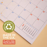 2027 compact wall calendar, punched hole for hanging, recycled paper