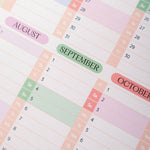 2027 Wall Calendar with colourful titles for August, September, and October.