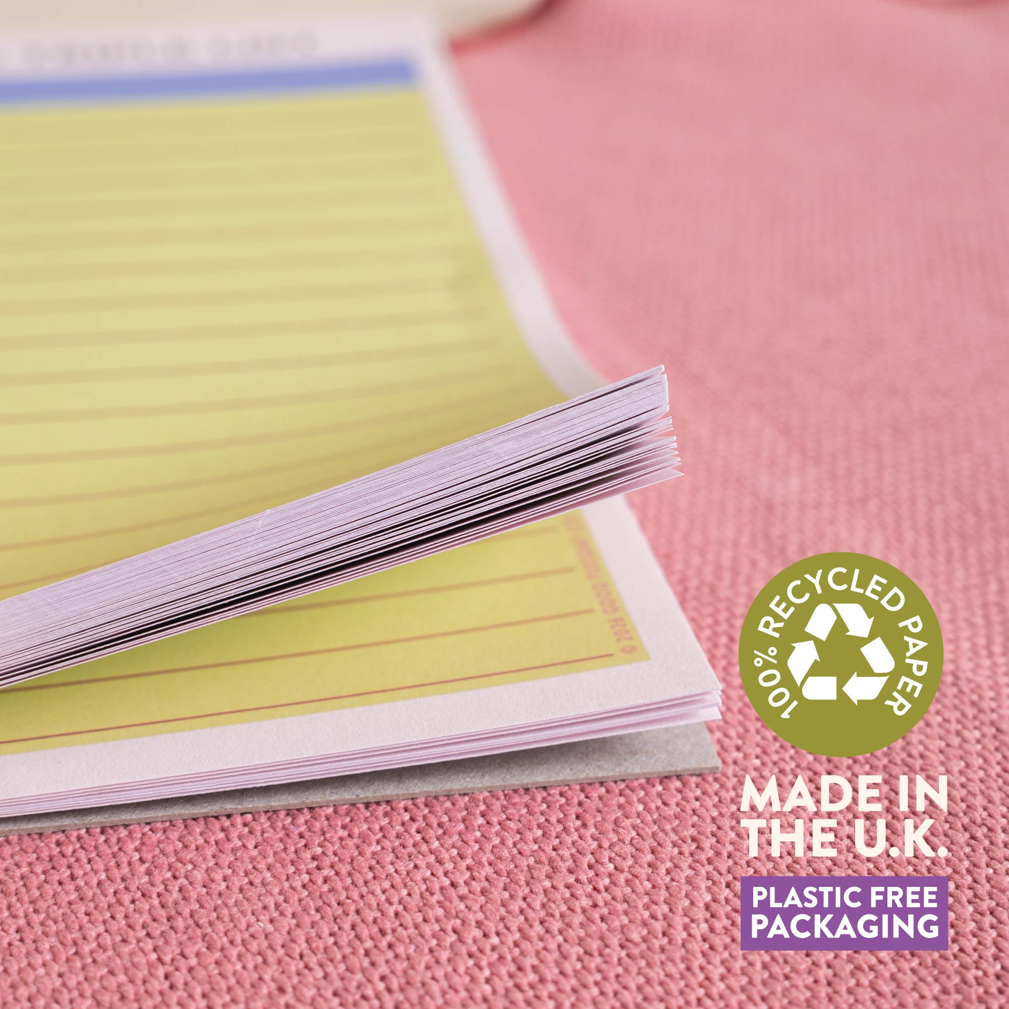 A4 tear away list pad with pages glued along top edge being flipped through