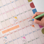 Close up in use shot of 2027 Play Nice A1 Wall Planner.