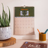Close up of A4 academic calendar printed on recycled paper with bronze wire binding