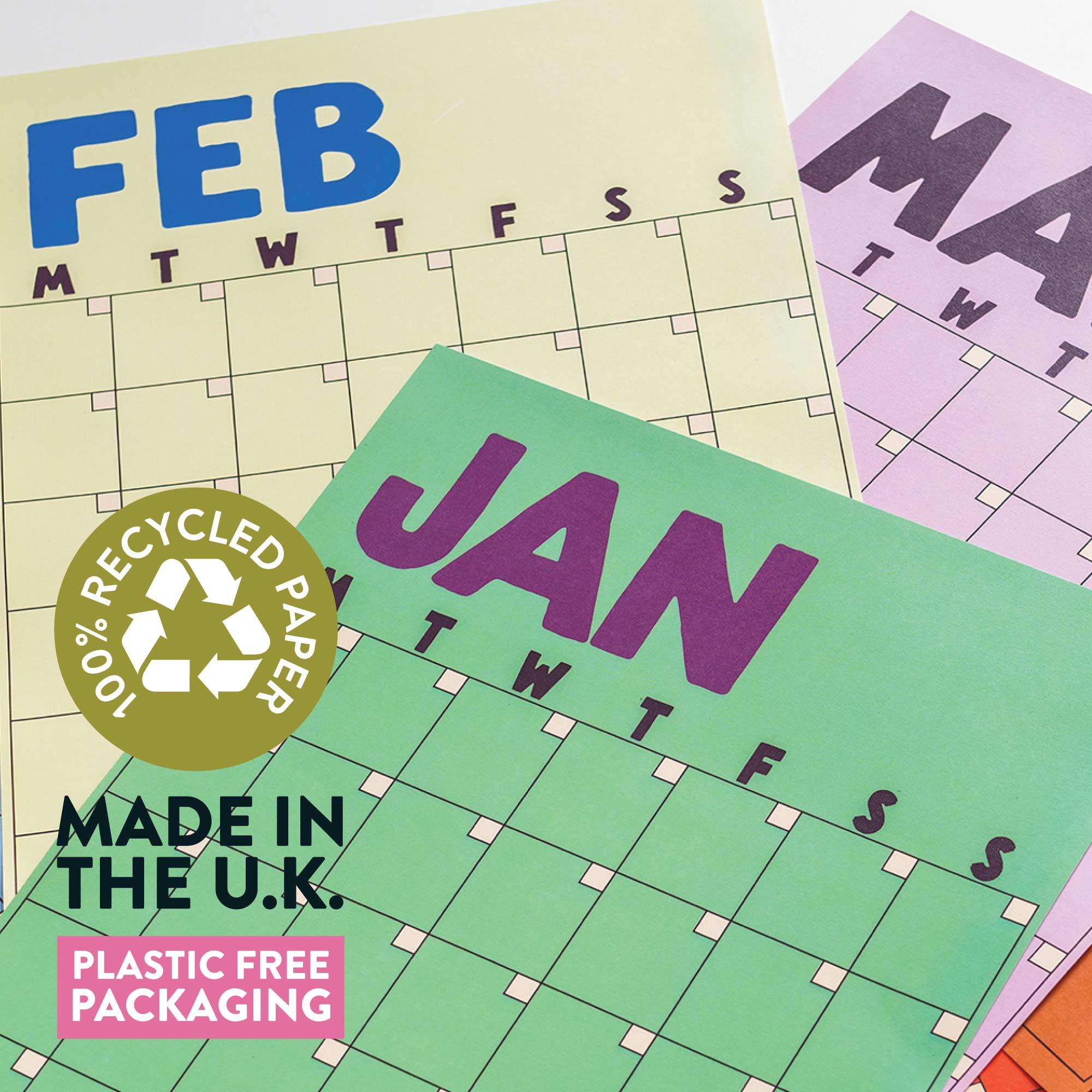 Three colorful calendars for January, February, and March with a recycling logo and text about recycled paper and plastic-free packaging.
