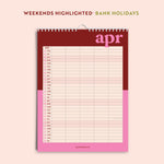 Family wall calendar showing highlighted weekends and UK and US holidays