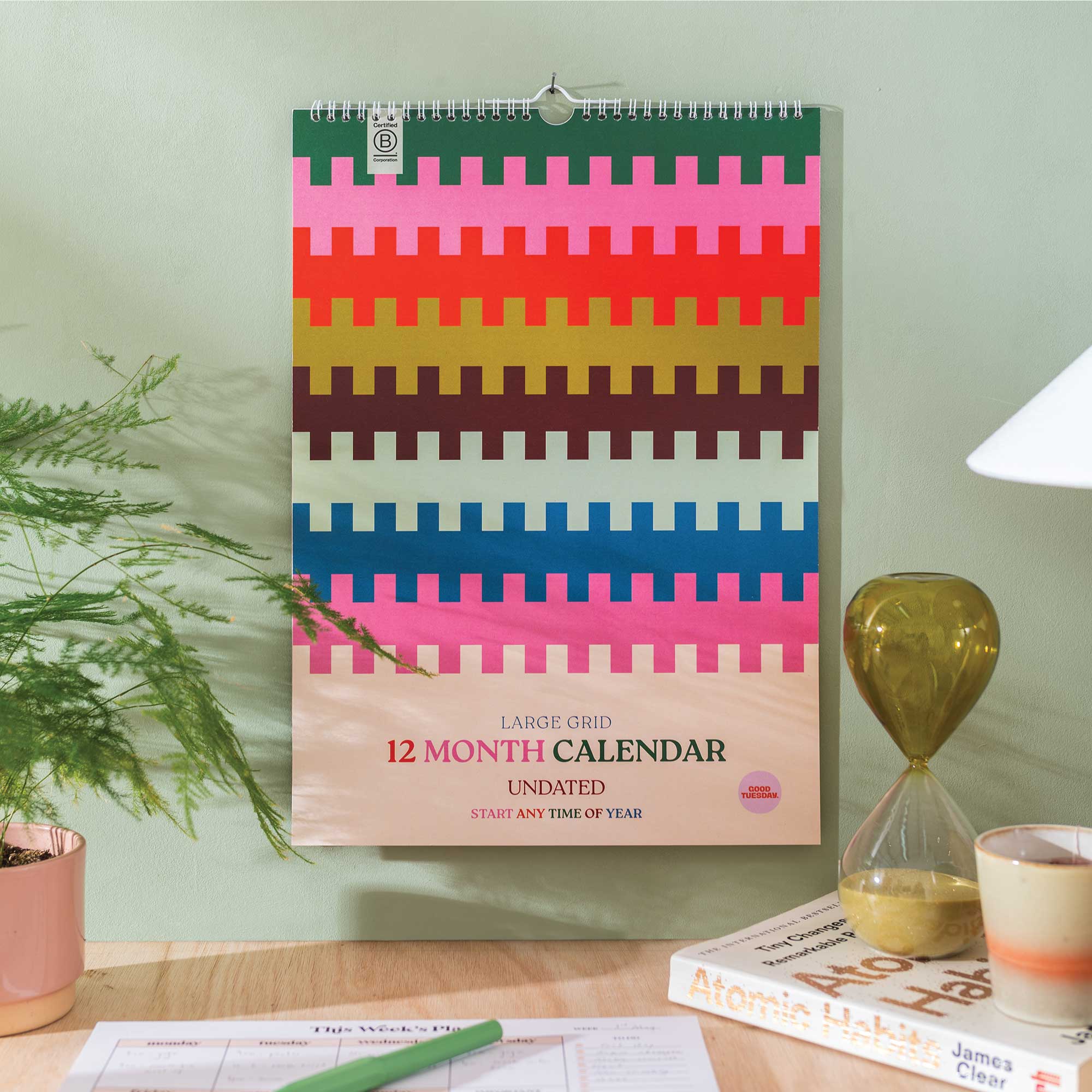 Undated monthly planner with colourful tabs and recycled paper