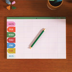 A4 weekly and monthly planner pad in bold Work Hard Play Nice design