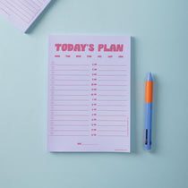 Lilac and Plum A5 daily planner pad with a Today's Plan schedule and a pen