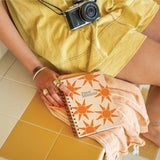 A5 Sunbeam Travel Journal with a vibrant sunbeam cover design, ideal for documenting travel adventures.