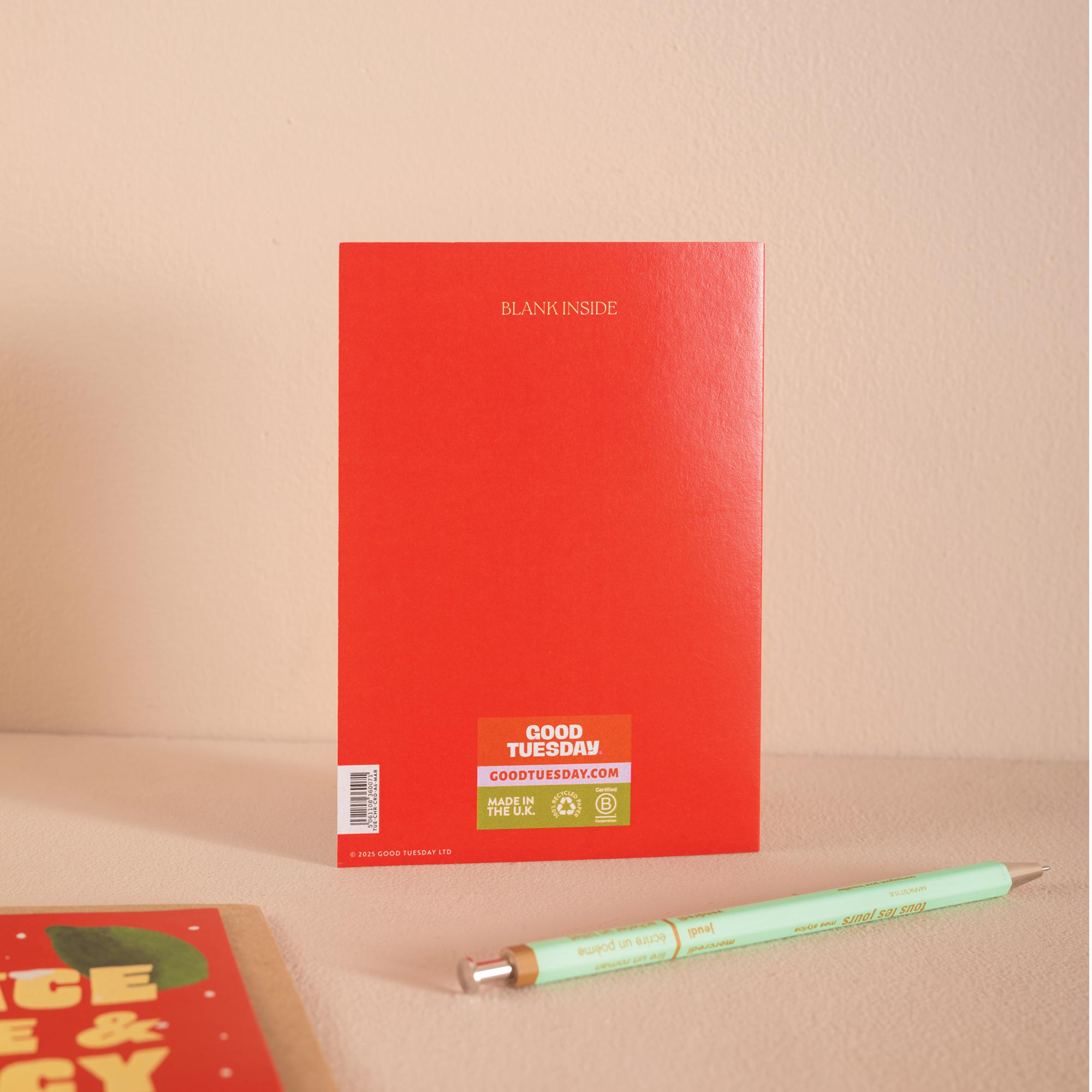 Red Christmas card with 'Peace Love & Spicy Margs' text.