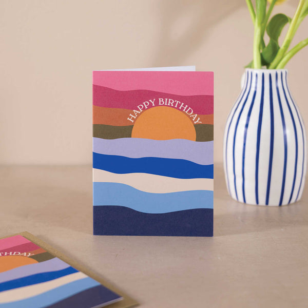 Sunset birthday card, seascape card design, calming waves birthday card, coastal-inspired card, eco-friendly greeting card UK, recycled stationery, blank birthday card for friends and family.