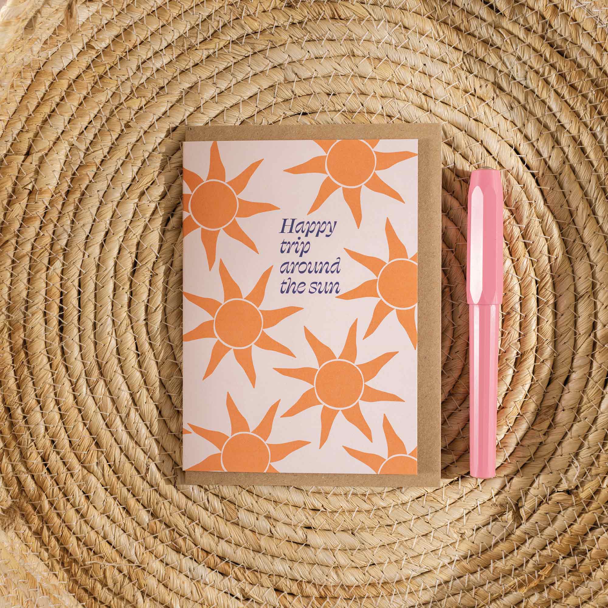 Trip around the sun birthday card, sunbeam birthday card, bold sun design card, eco-friendly birthday card UK, modern greeting card, recycled card, adventure-themed birthday card.